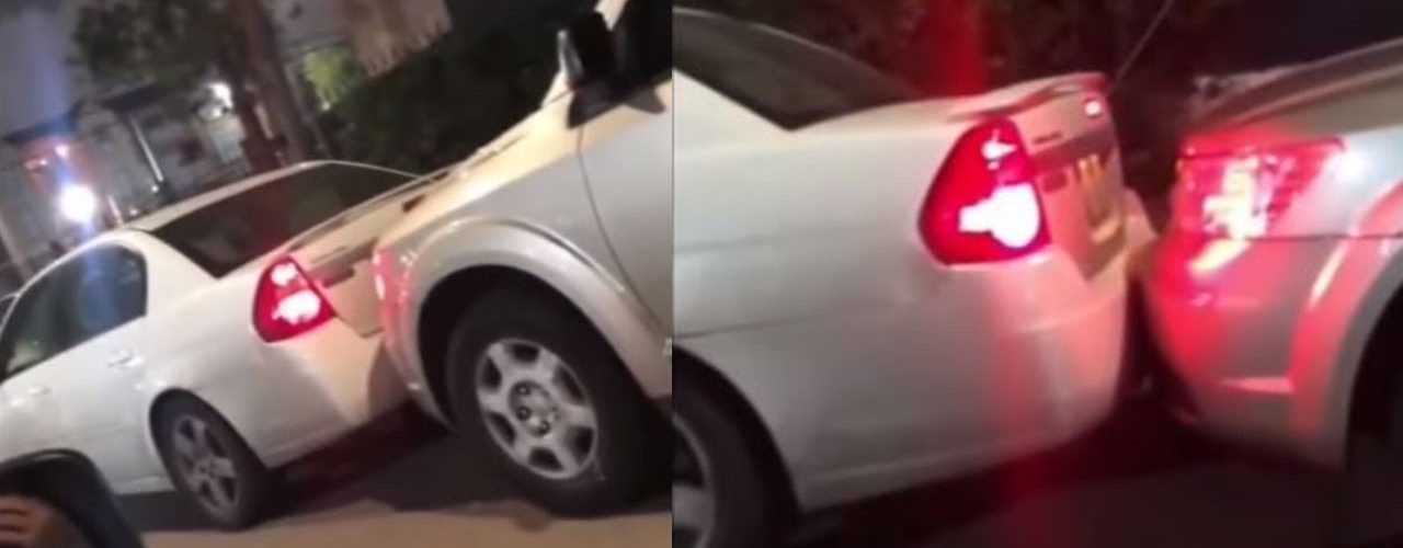 car pushes suv to get out of tig