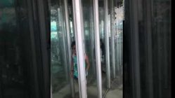 kid walks into glass mirror