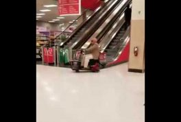 old man tries to ride escalator