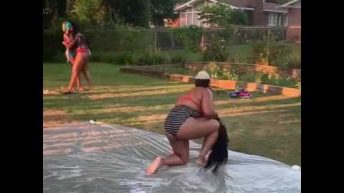 woman loses slip and slide race