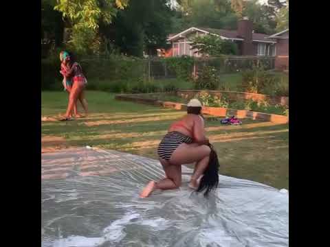 woman loses slip and slide race