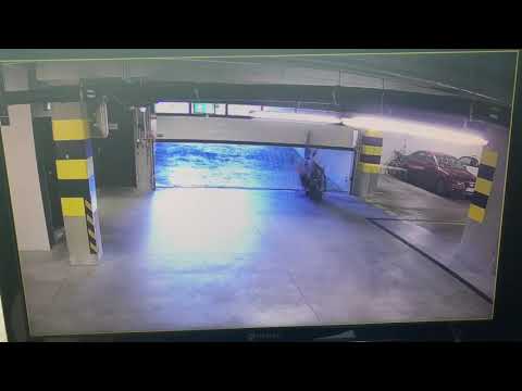 cyclist slams himself on garage
