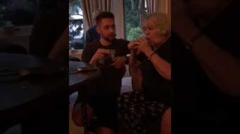 grandma takes a shot of tequila