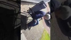old lady gets stuck in chair