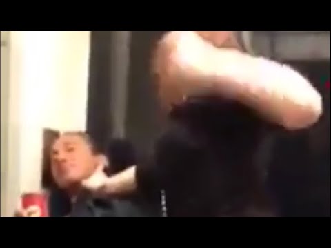 woman fights man on subway