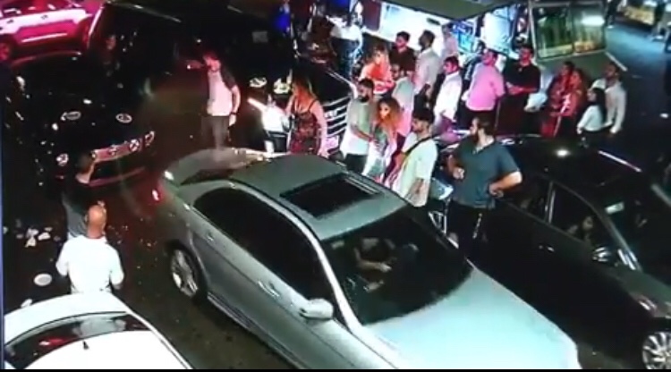 angry woman smashes mercedes
