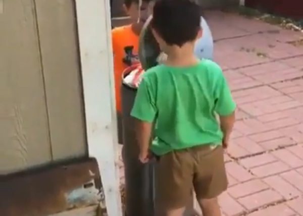 Kids hit their heads with a garbage can