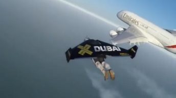 Man flies jetpack beside plane in Dubai