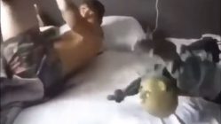 doll scares man in bed