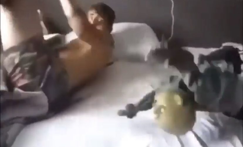 doll scares man in bed