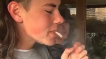 Guy eats cigarette