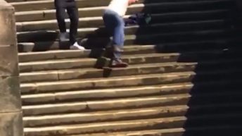 man falls down stairs