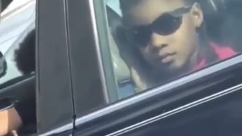 girl caught kissing backseat of car
