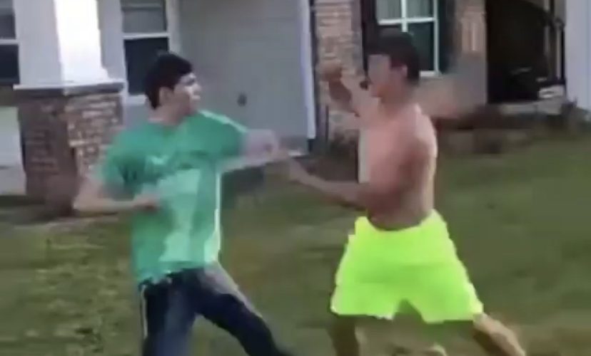 guys fighting in yard