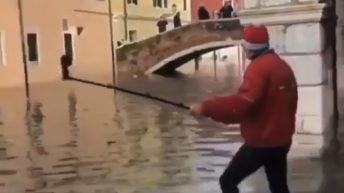 tourist falls in floodwater