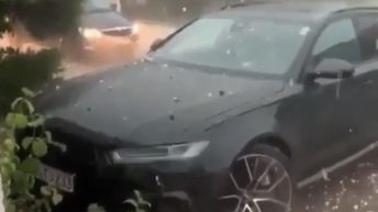 Hailstorm destroys car