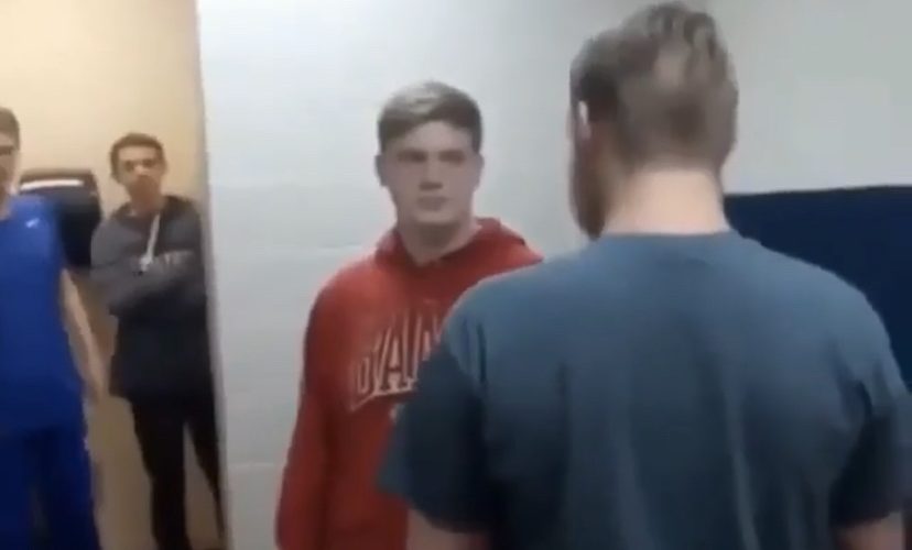 men fight in the bathroom