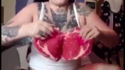 Woman eats raw meat