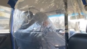 uber driver drives in plastic bag