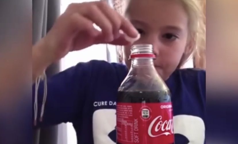 Funny girl puts mentos in coke