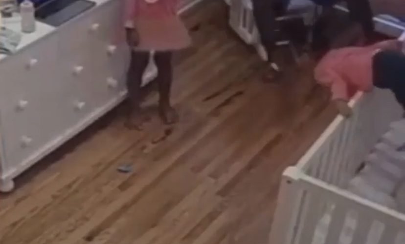 father catches daughter from falling crib