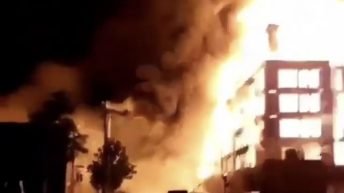 Protestors burn building in Minneapolis