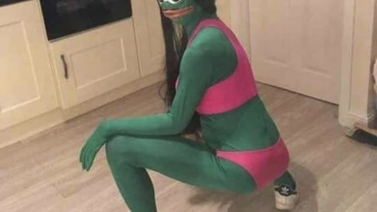 Woman dresses as Pepe the frog