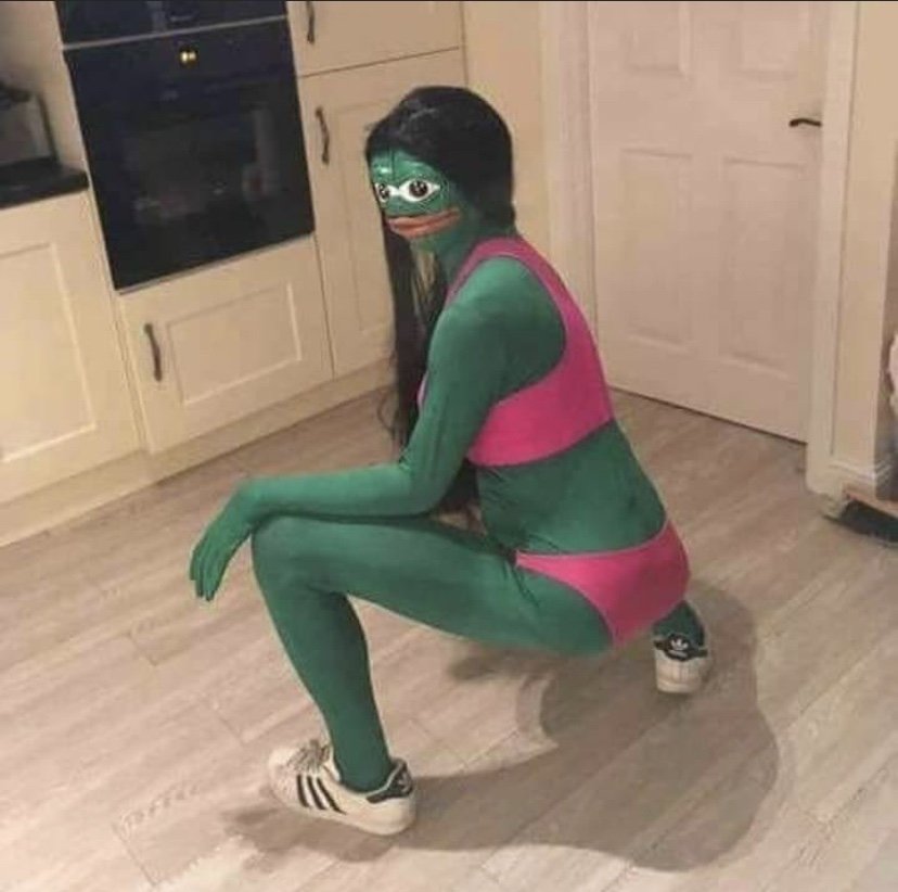 Woman dresses as Pepe the frog