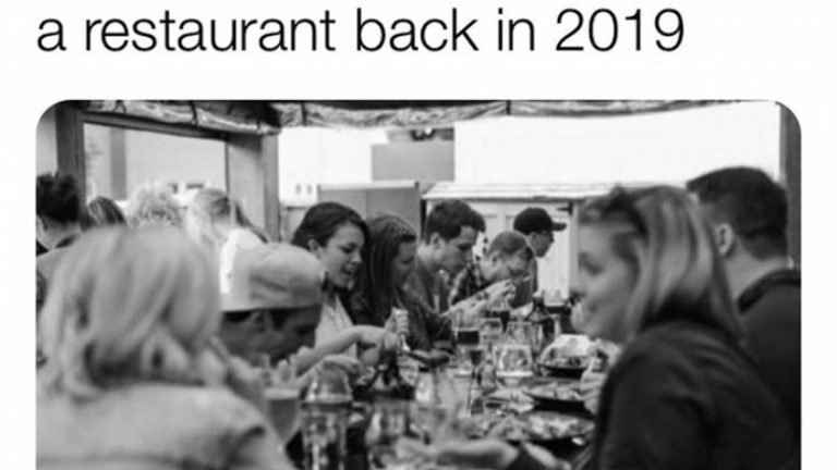 Old picture of people eating in a restaurant back in 2019 meme