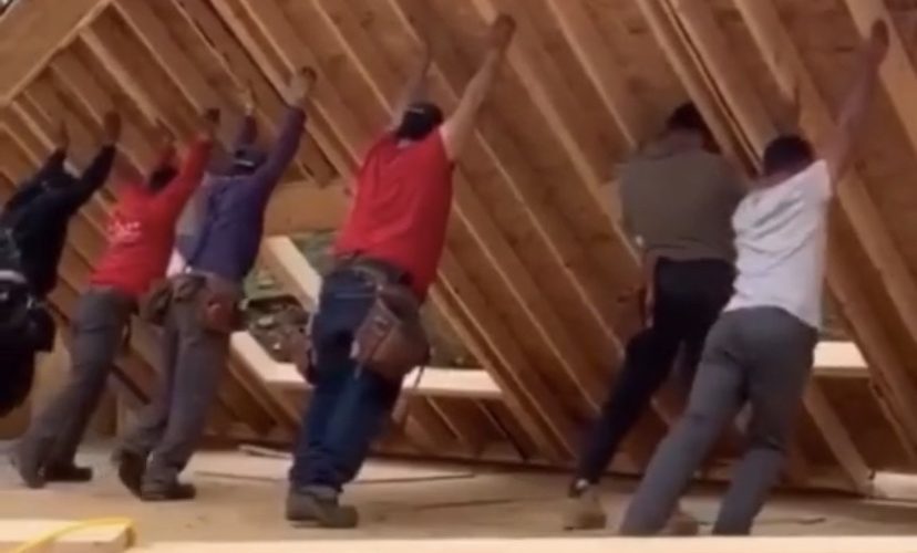 Construction workers building a house fail