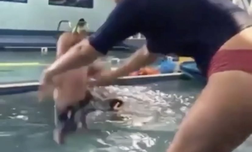 Natural way of teaching a baby how to swim