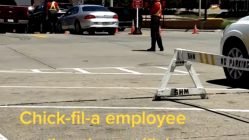 Chick-Fil-A employee directs traffic