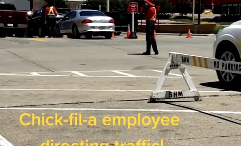 Chick-Fil-A employee directs traffic