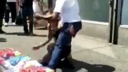 Group of people street brawl