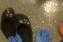 Men wear gloves on feet