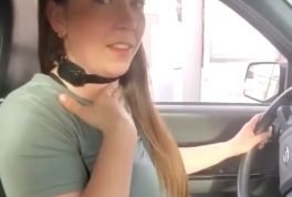 Woman wears dog collar in drive thru