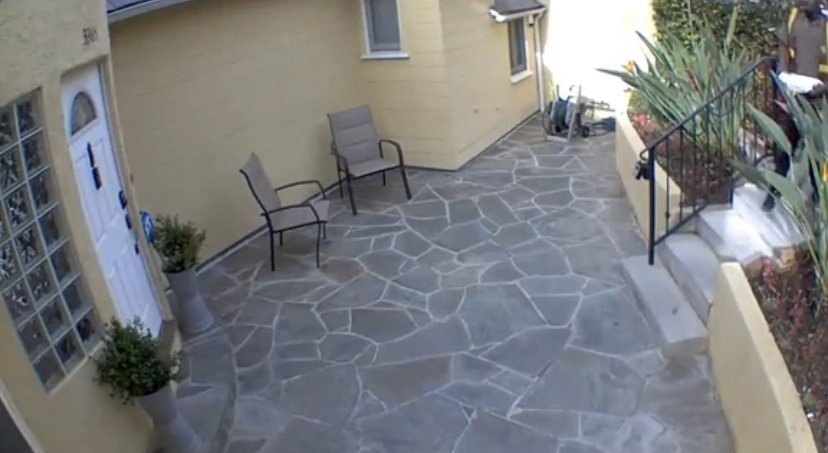delivery driver throws package