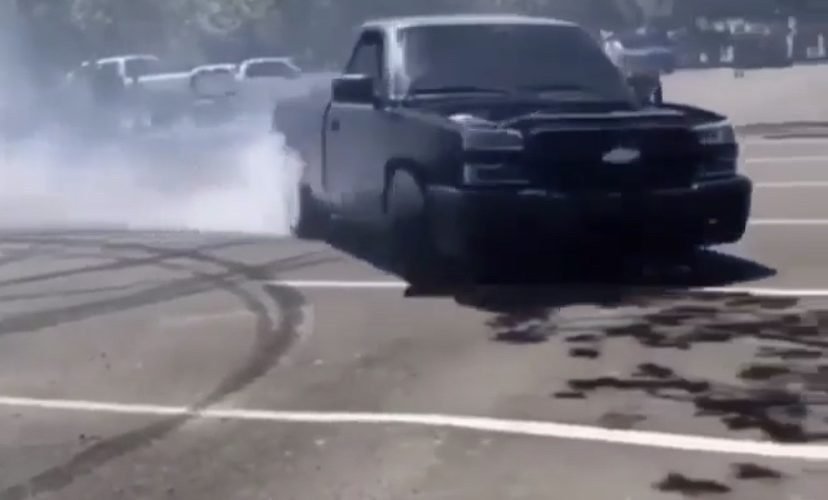Man stands too close to drifting truck