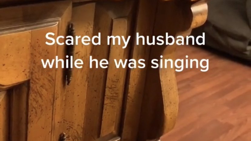Husband gets caught off guard while singing