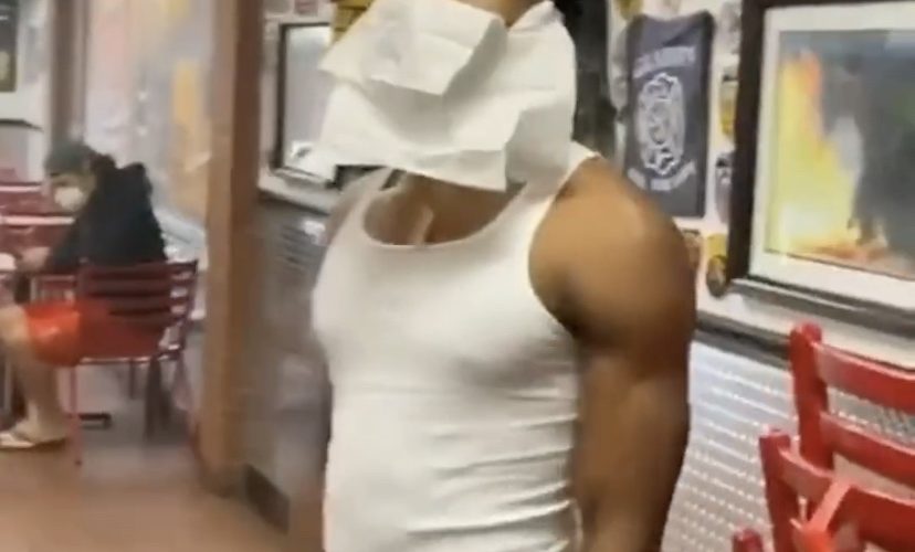 Man makes face mask out of napkins