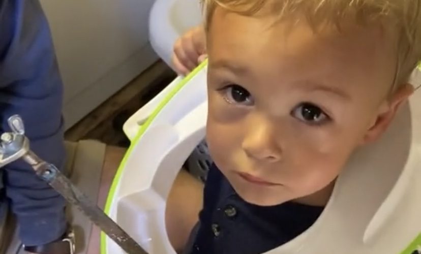 Toddler gets toilet seat stuck around his neck