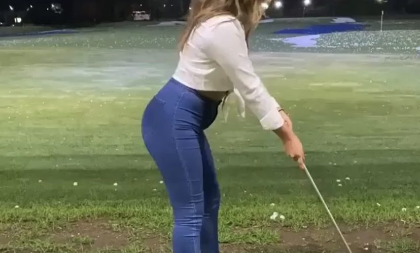 Woman golf swing fail