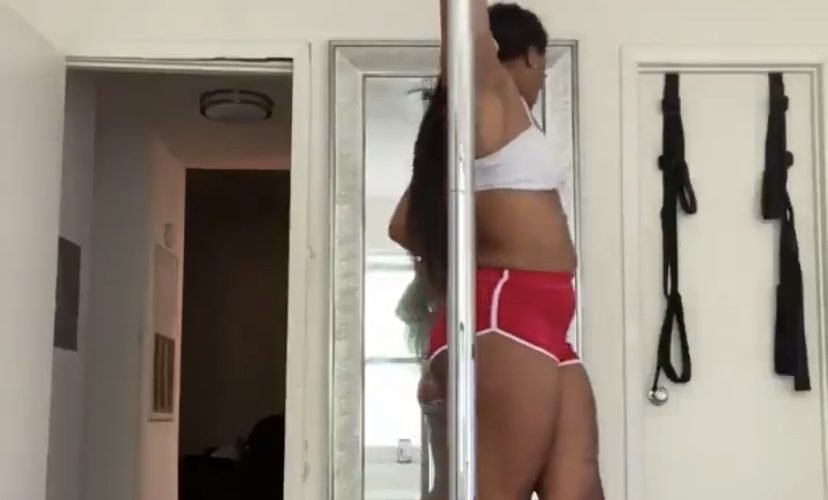 Pole dancing while house burns down