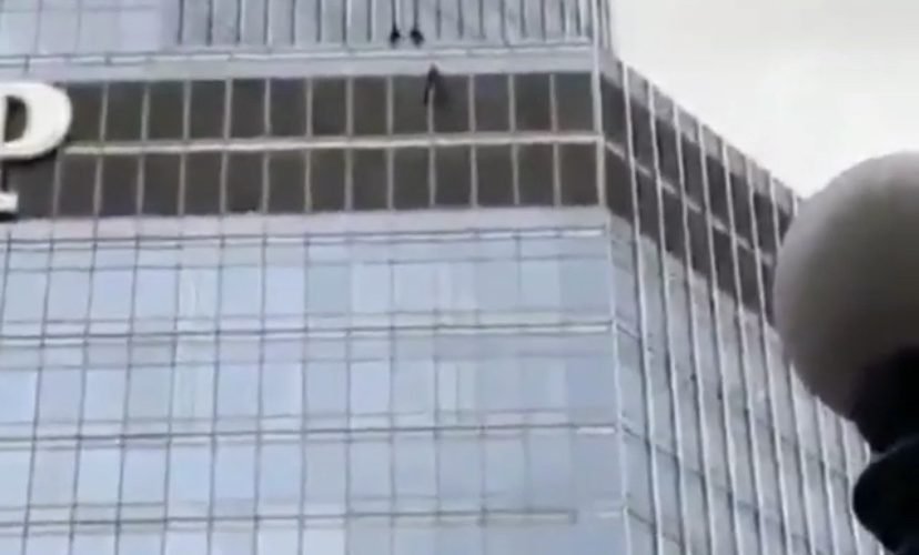 Man scales Trump tower demanding to speak to Trump