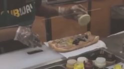 Subway worker slumps while making sandwich