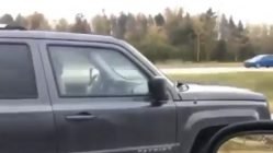 Woman drives car on bare rim