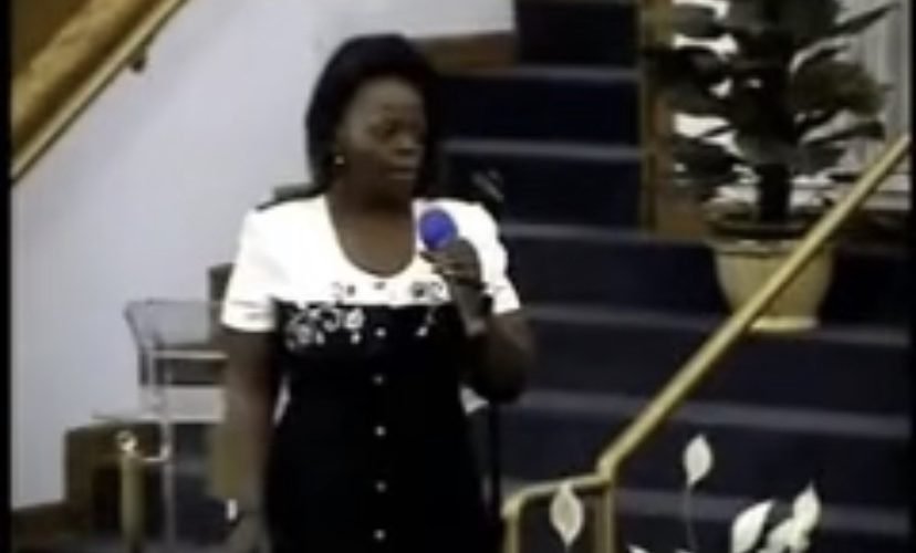 Woman sings gospel song in church