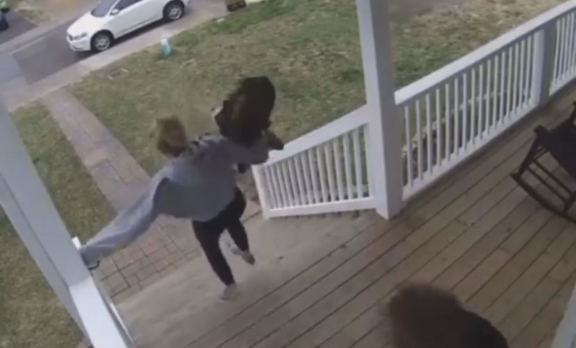 Woman slips and falls down steps