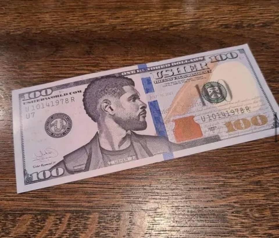 Usher pays strippers with fake money