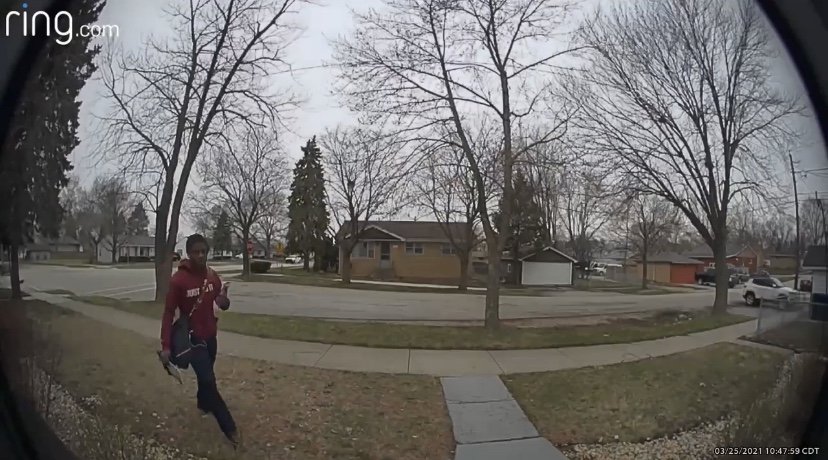 Scared mailman takes off running on delivery